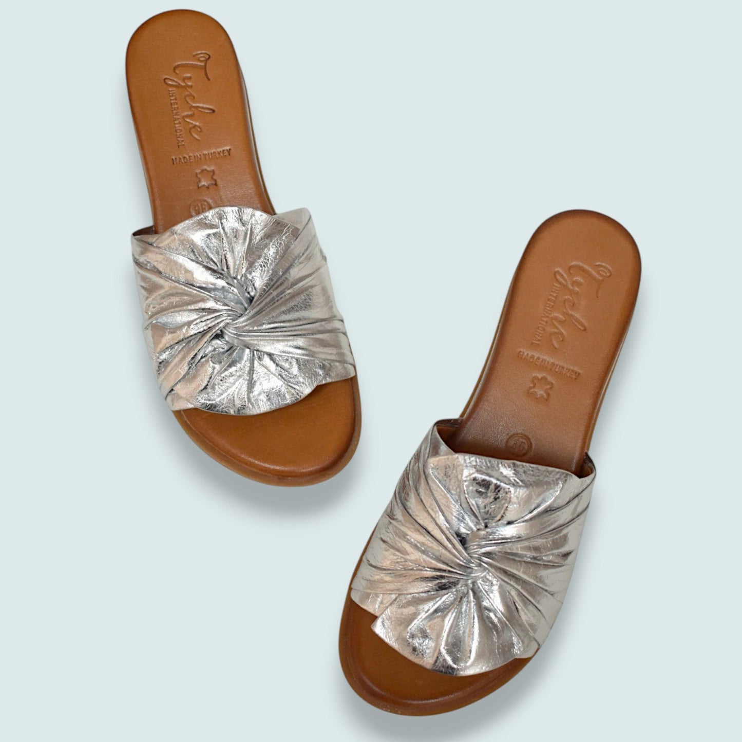 Tyche - Metallic Silver Twist Slide Sandal