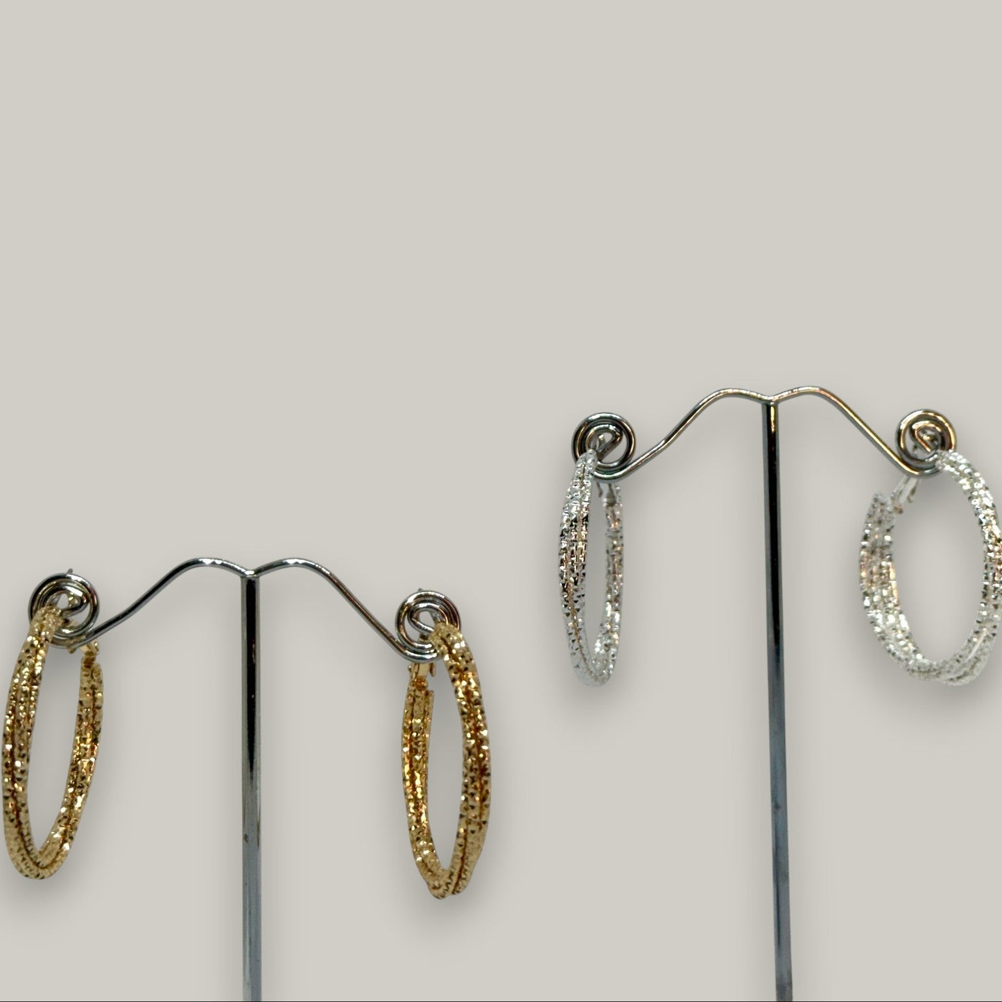EL-KA - Twisted Radiance Hoop Earrings