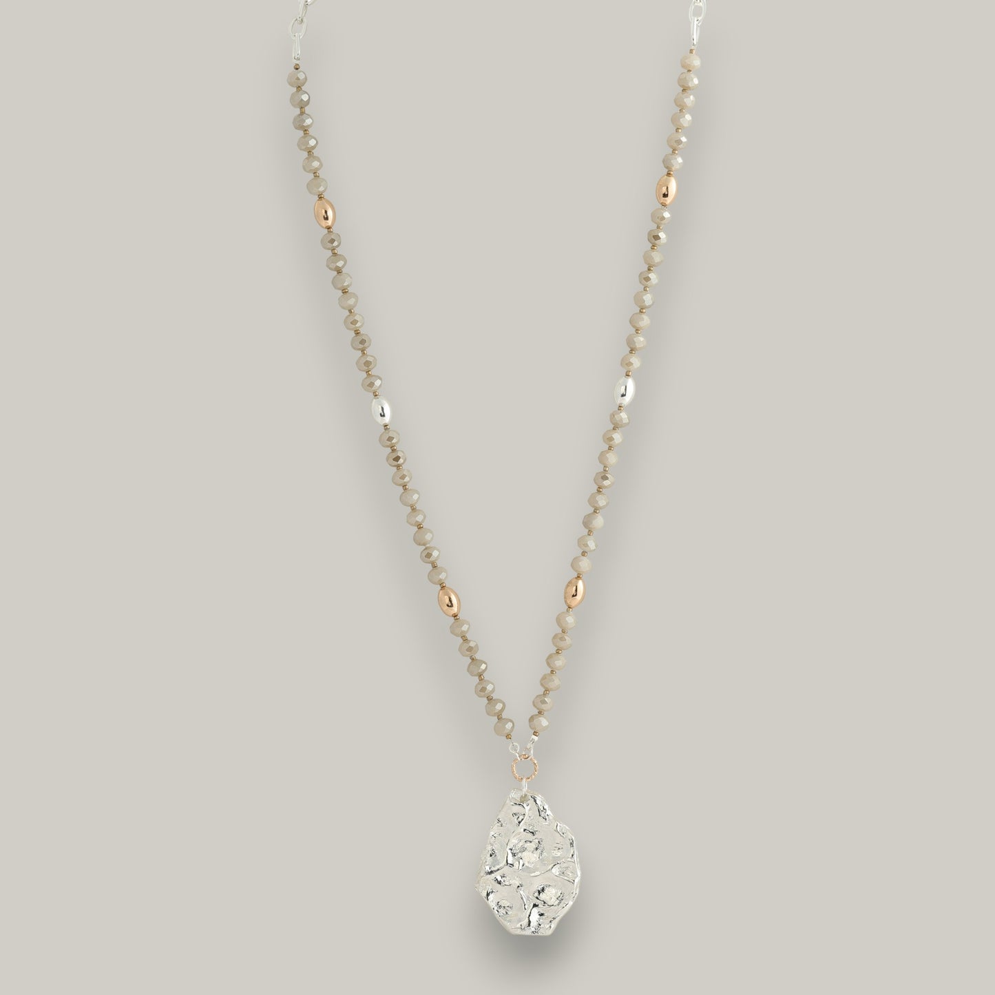 Merx - Beaded Necklace with a Hammered Silver Pendant