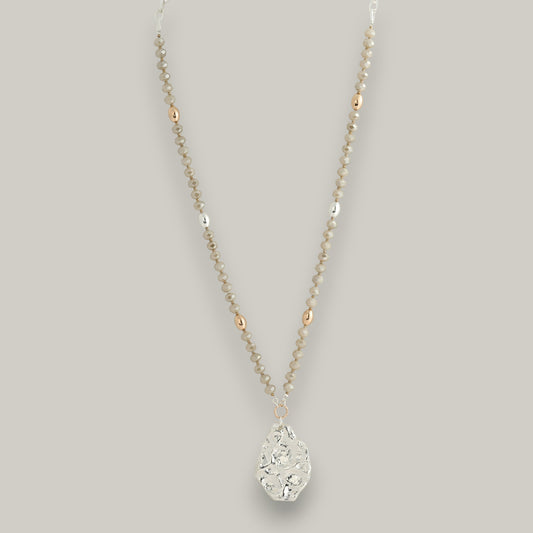 Merx - Beaded Necklace with a Hammered Silver Pendant