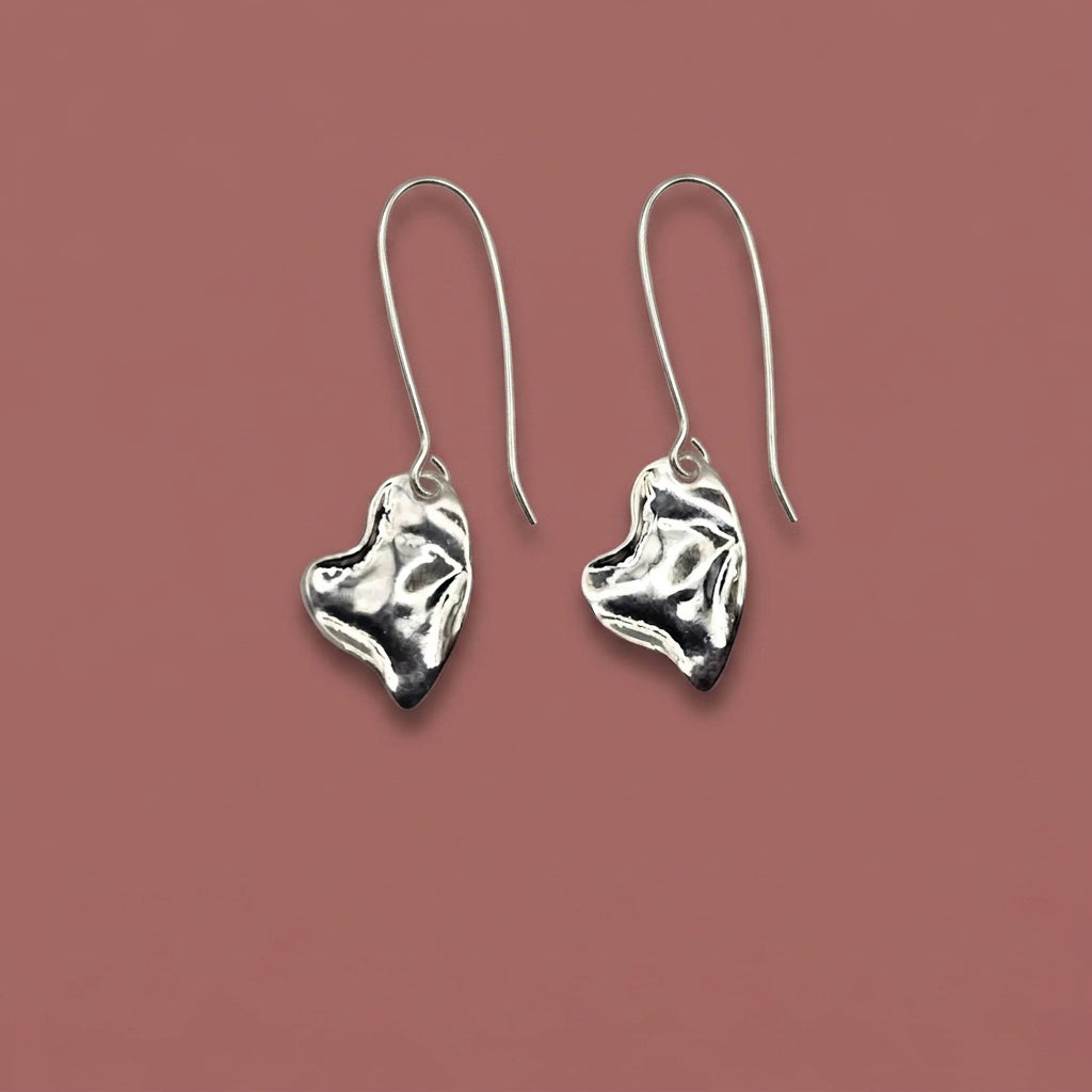 Audrey's - Silver Hammered Metal Heart Earrings