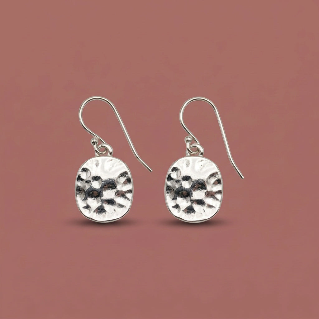 Audrey's - Silver Hammered Metal Statement Earrings