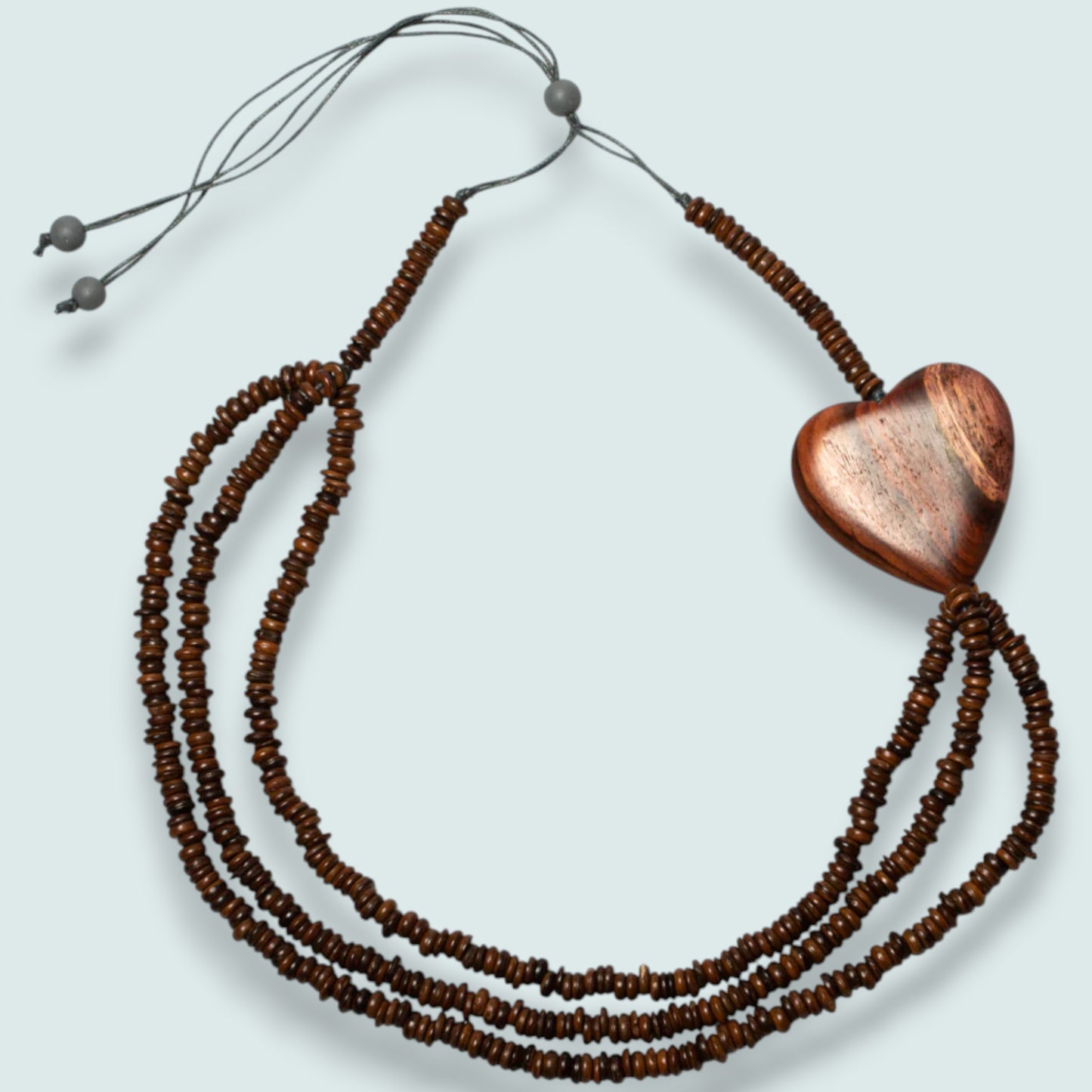 Audrey's - Triple Strand Coconut Bead & Wooden Heart Necklace