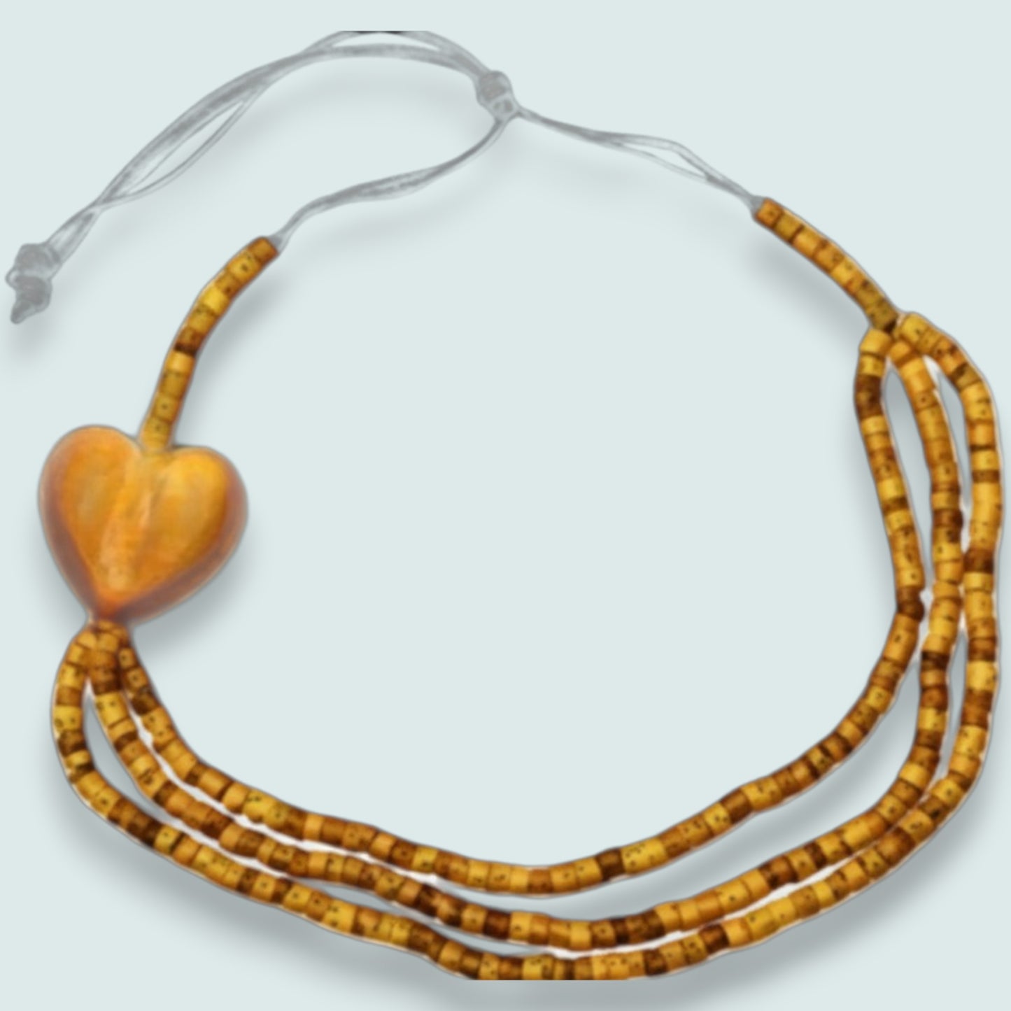 Audrey's - Triple Strand Coconut Bead & Wooden Heart Necklace
