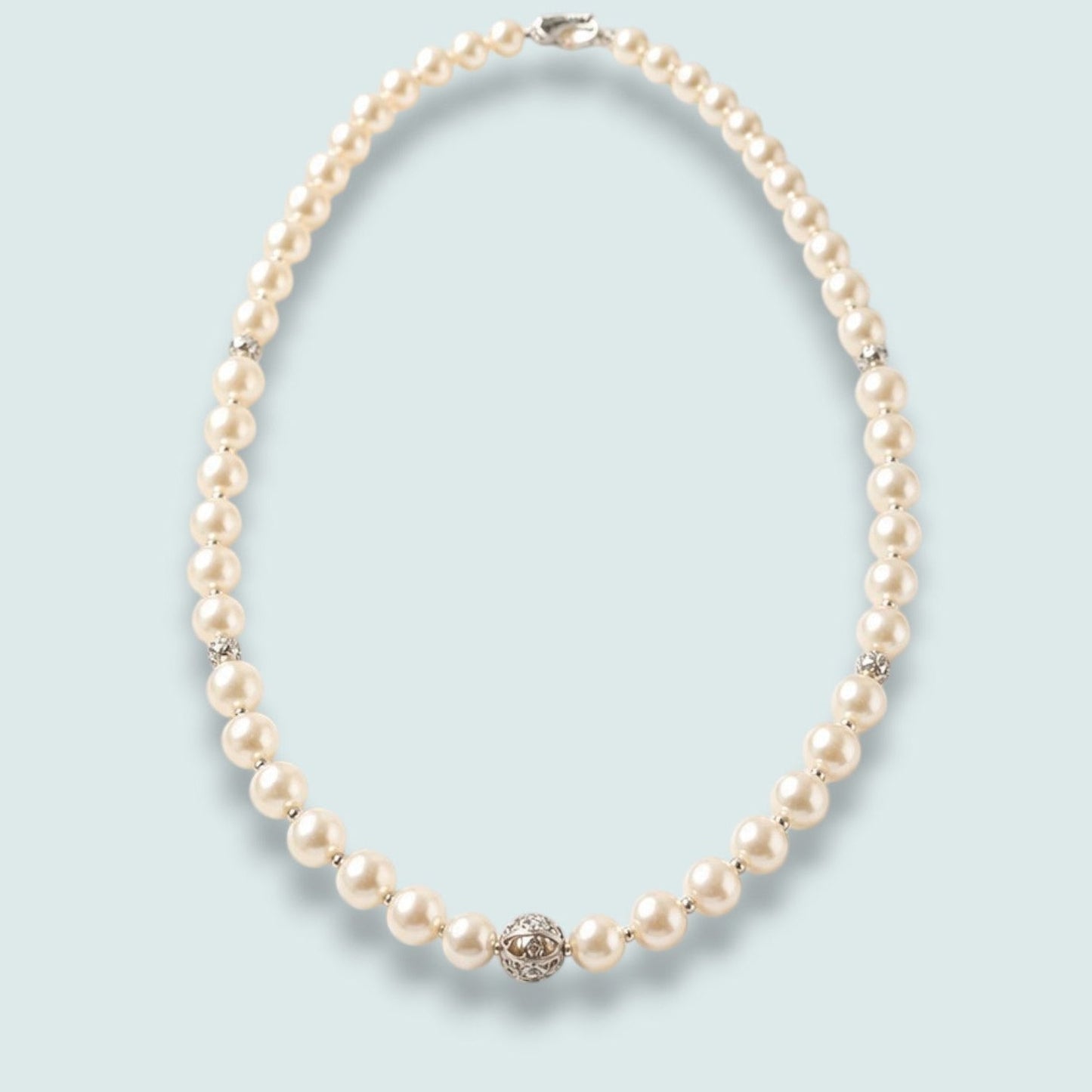 Audrey's - Classic Pearl Strand Necklace With Decorative Center Detail