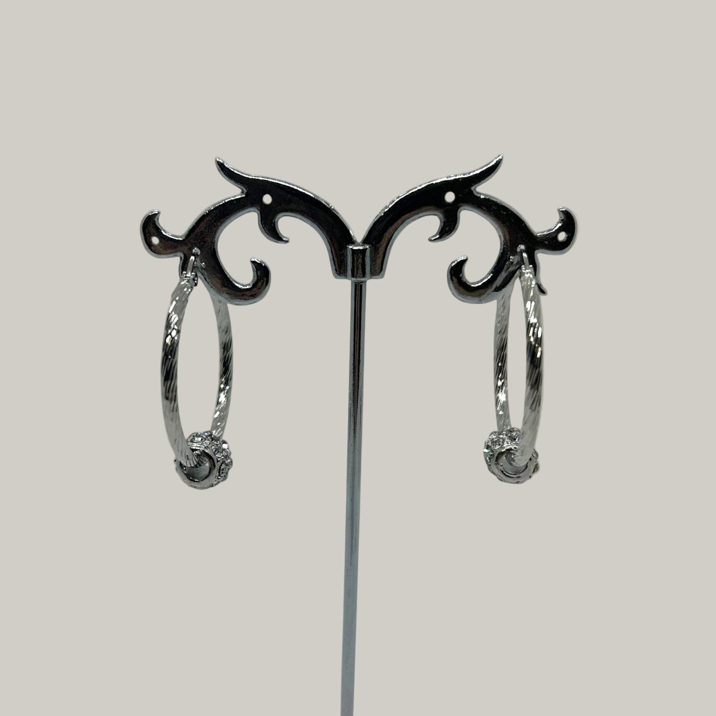 EL-KA - Crystal Accent Twisted Hoop Earrings